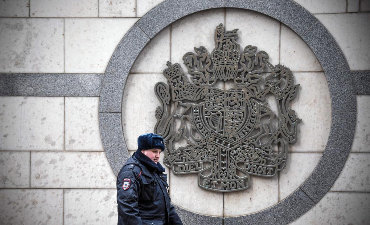 Above, a police officer patrols outside the British embassy building in Moscow on March 14, 2018. (AFP)