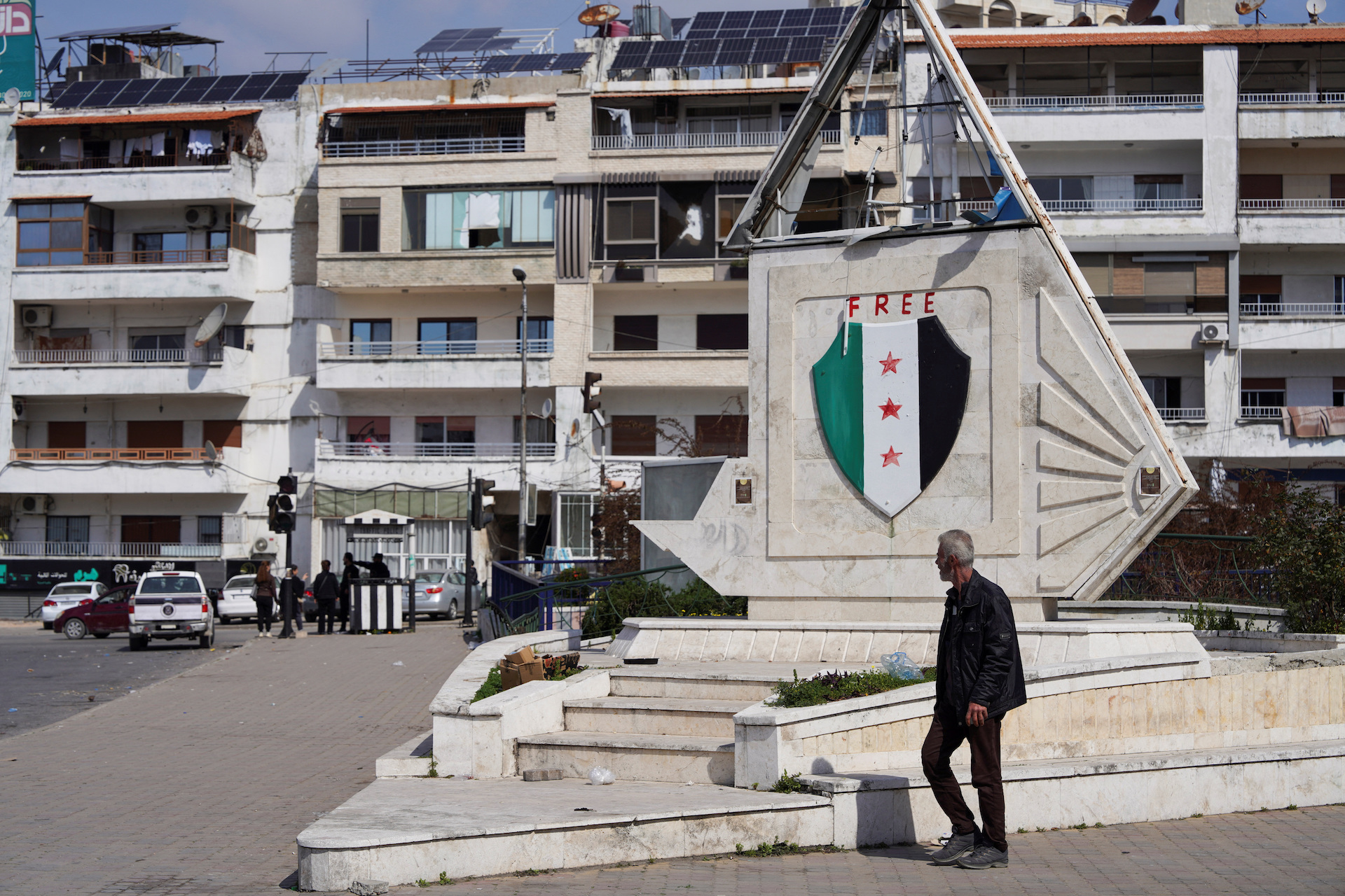 A man walks along a street, after hundreds were killed in some of the deadliest violence in 13 years of civil war, pitting loyalists of deposed President Bashar al-Assad against the country's new Islamist rulers in Latakia, Syria March 9, 2025. (Reuters)