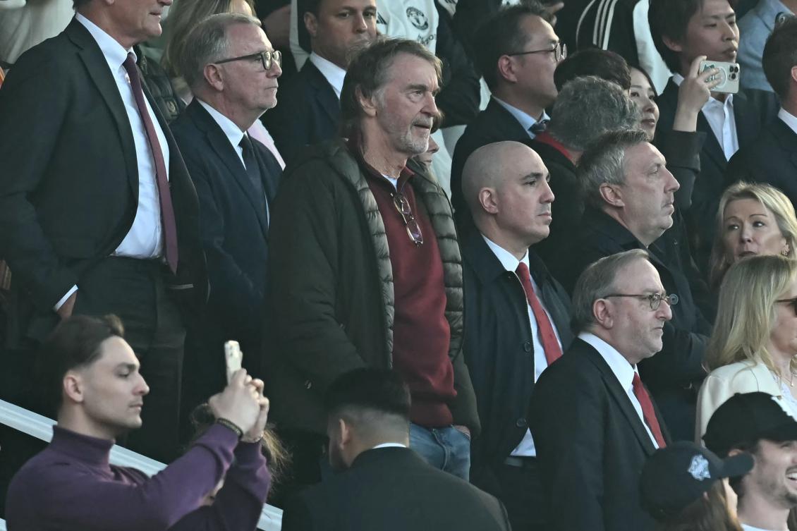 Manchester United’s co-owner Jim Ratcliffe, center, takes his seat for the EPL match between Manchester United and Arsenal at Old Trafford in Manchester, England, Mar. 9, 2025. (AFP)