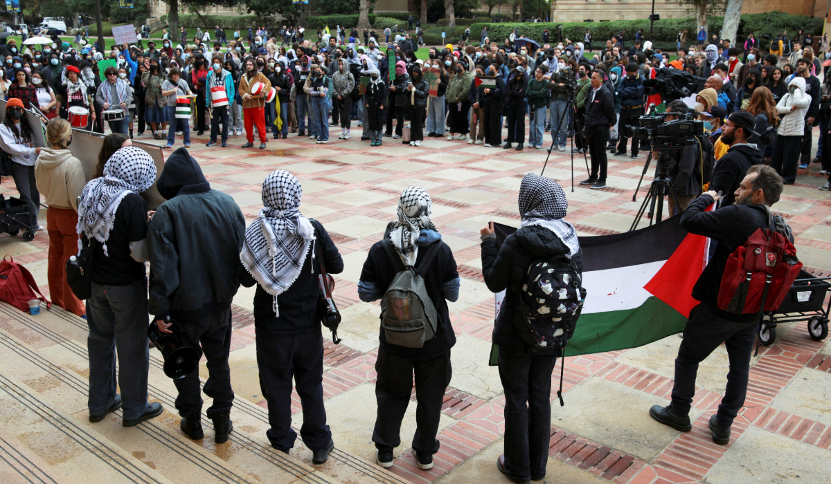 Demonstrators attend a protest at the University of California Los Angeles (UCLA), following the arrest by U.S. immigration agents of Palestinian student protester Mahmoud Khalil, in Los Angeles, California, U.S. March 11, 2025. (REUTERS)
