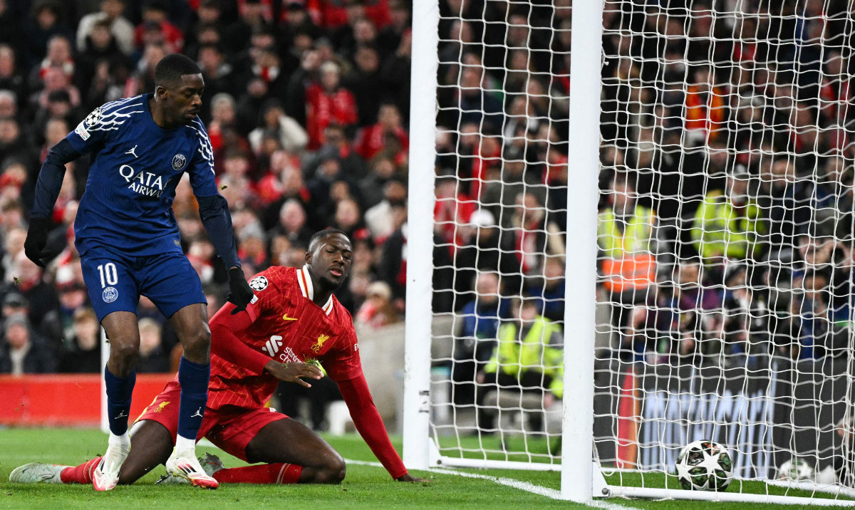 Paris Saint-Germain's French forward #10 Ousmane Dembele shoots and scores his team first goal during the last 16 second leg UEFA Champions League football match between Liverpool and Paris Saint-Germain (PSG) at Anfield in Liverpool, north west England on March 11, 2025. (AFP)