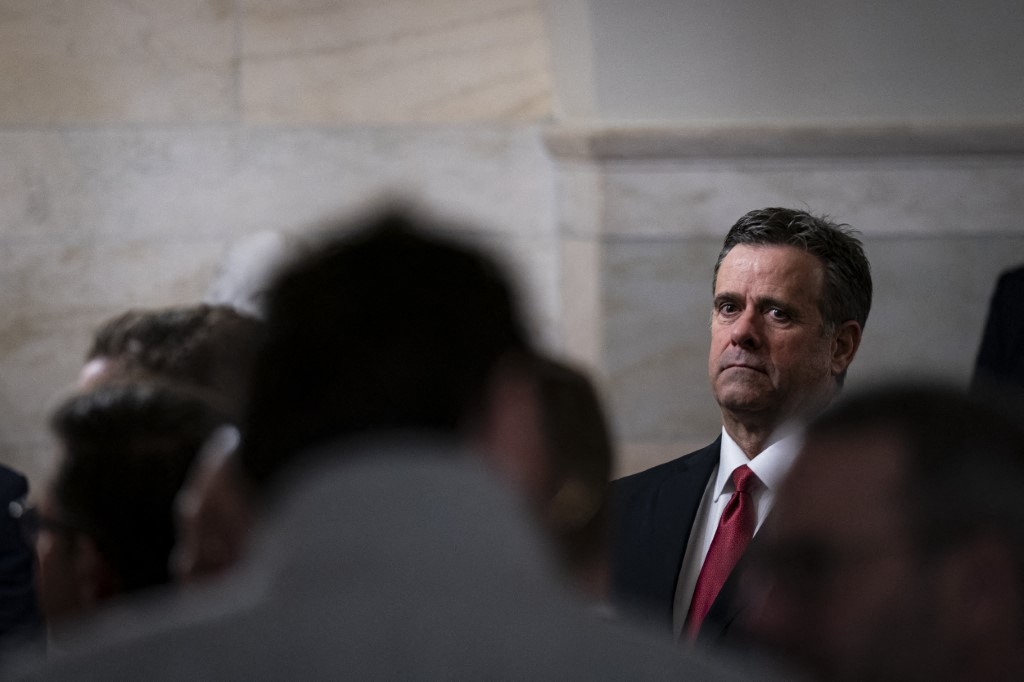 CIA Director John Ratcliffe watches U.S. President Donald Trump welcome Marc Fogel back to the United States after being released from Russian custody, at the White House on February 11, 2025 in Washington (AFP)