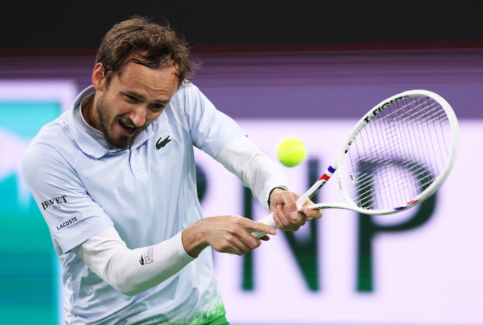 Daniil Medvedev plays a backhand against Tommy Paul of the US in their fourth round match during the BNP Paribas Open at Indian Wells Tennis Garden on Tuesday in Indian Wells, California. (AFP)