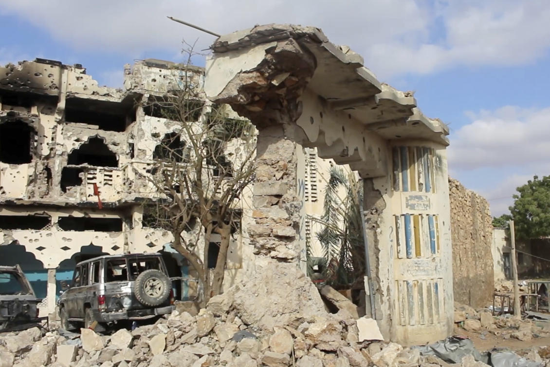 Frame grab from video shoot Wednesday, March 12, 2025, showing the aftermath of a car bomb exploded Tuesday at a hotel in the central Somali city of Beledweyne, kicking off an hourslong militant attack that killed an unknown number of people. (AP Photo from video)