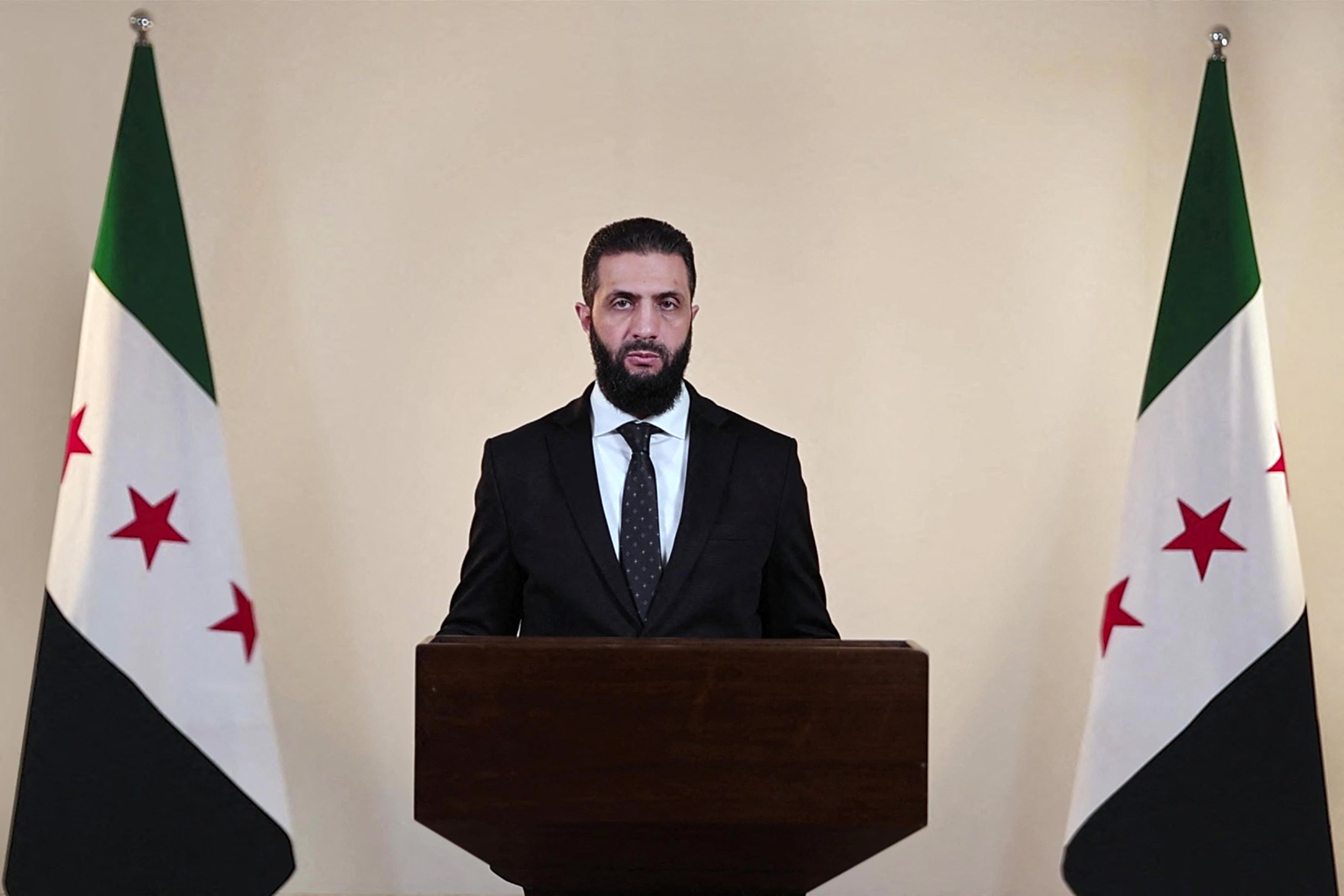 Syria's interim president Ahmed al-Sharaa speaking in Damascus on March 9, 2025. (AFP)