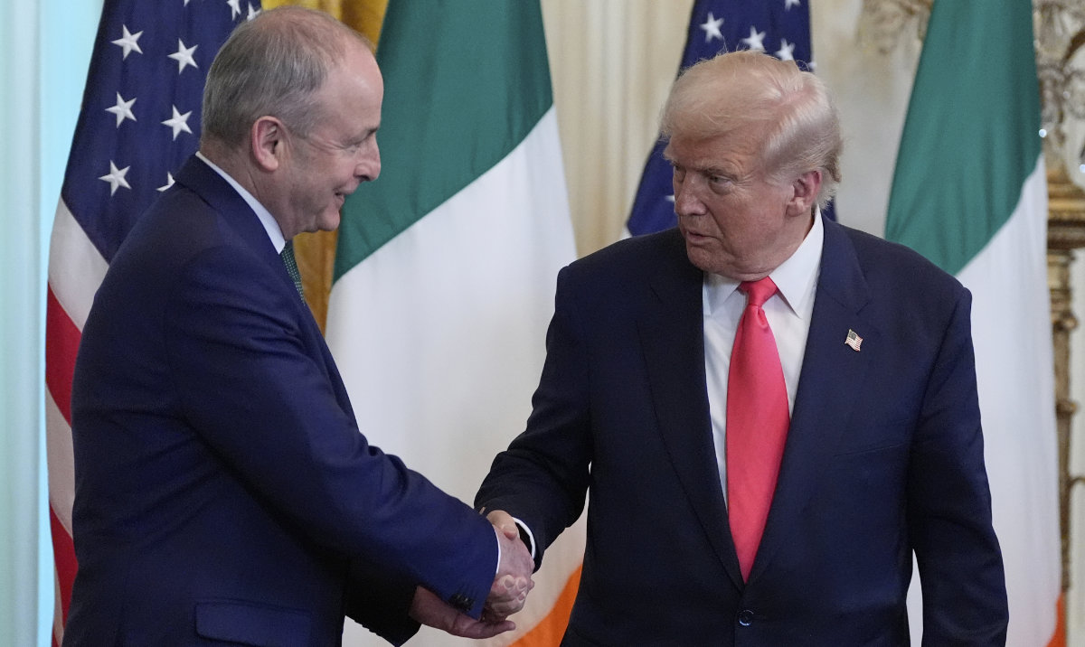 Ireland's Prime Minister Micheál Martin shakes hands with President Donald Trump during an event in the East Room of the White House in Washington, Wednesday, March 12, 2025. (AP)