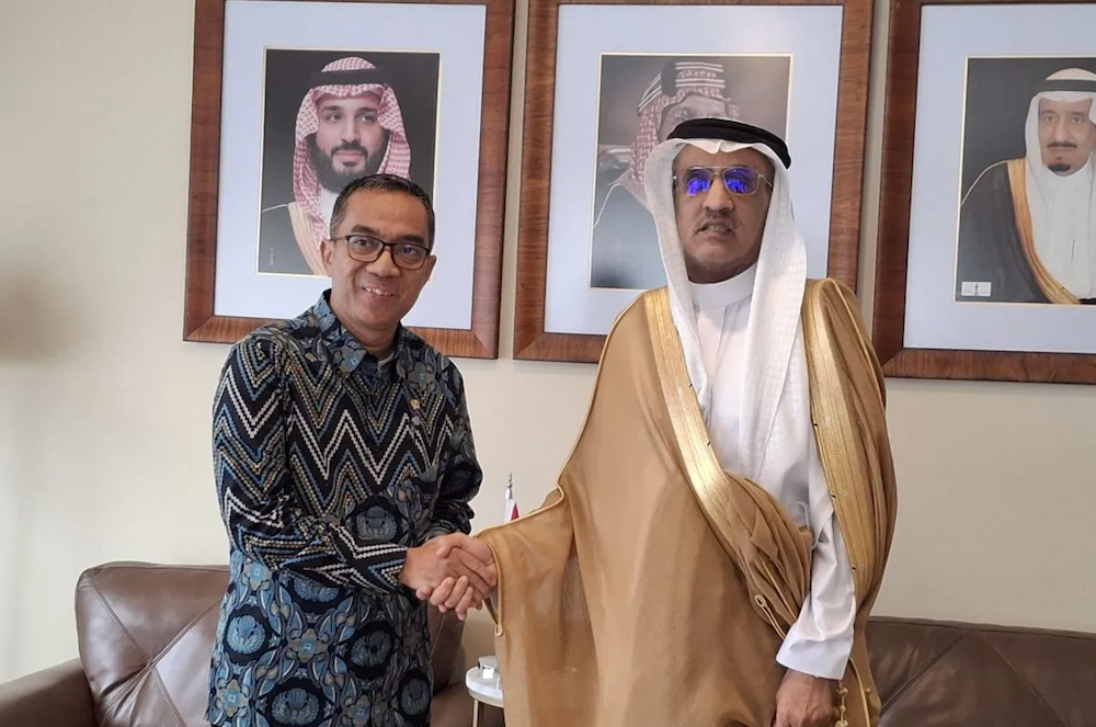 Indonesia’s Minister of Higher Education, Science and Technology Brian Yuliarto, shakes hands with Saudi Ambassador to Indonesia Faisal Abdullah Amodi during a meeting in Jakarta on March 12, 2025. (Antara)
