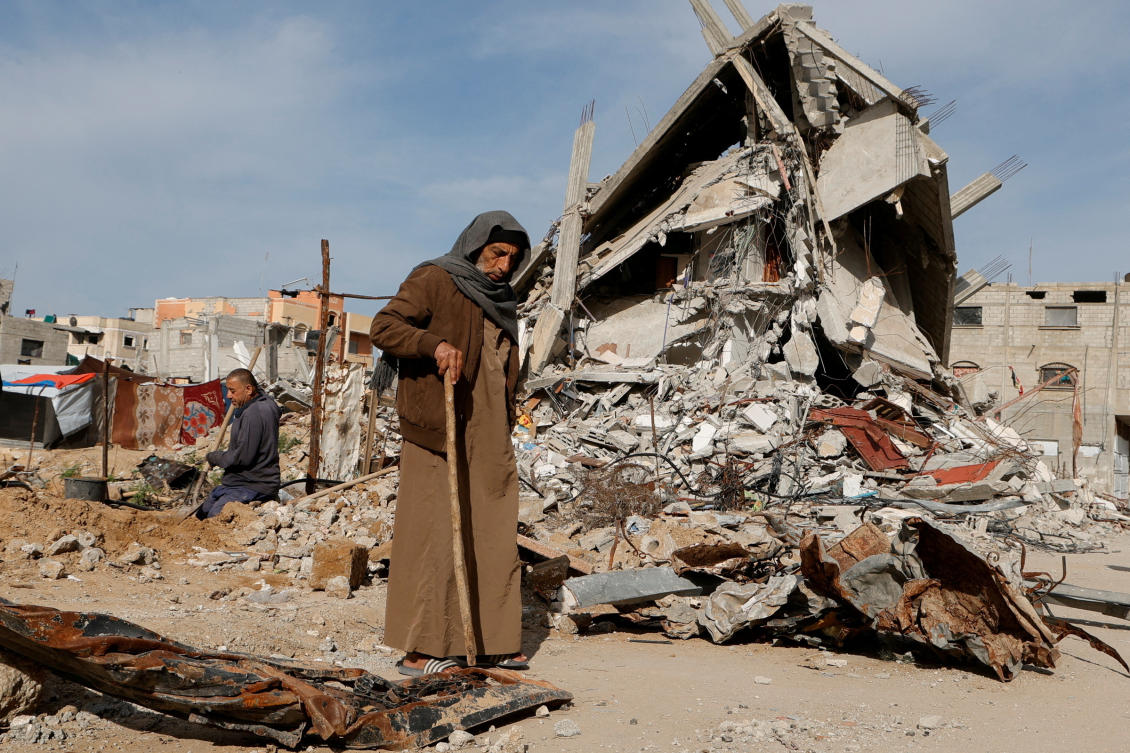 The Israeli offensive against Hamas has reduced Gaza Strip into rubble and ruins. Above, Palestinian man walks in Rafah amid destroyed property on March 13, 2025. (Reuters)
