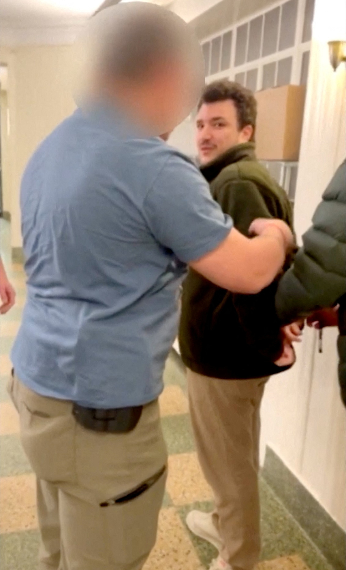 Mahmoud Khalil, a Columbia University student who played a prominent role in pro-Palestinian protests at the university, is detained by U.S. federal immigration agents in New York, U.S., March 8, 2025, in this still image obtained from a video. (REUTERS)
