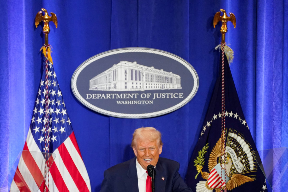US President Donald Trump speaks during his visit to the Department of Justice to address its workers in Washington, D.C., on March 14, 2025. (REUTERS)