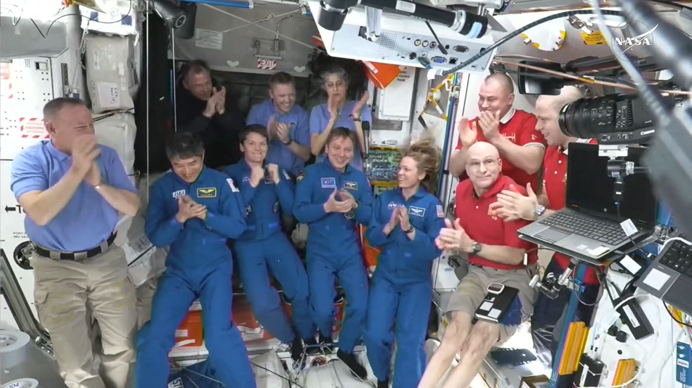 NASA’s stuck astronauts welcome their newly arrived replacements to the space station