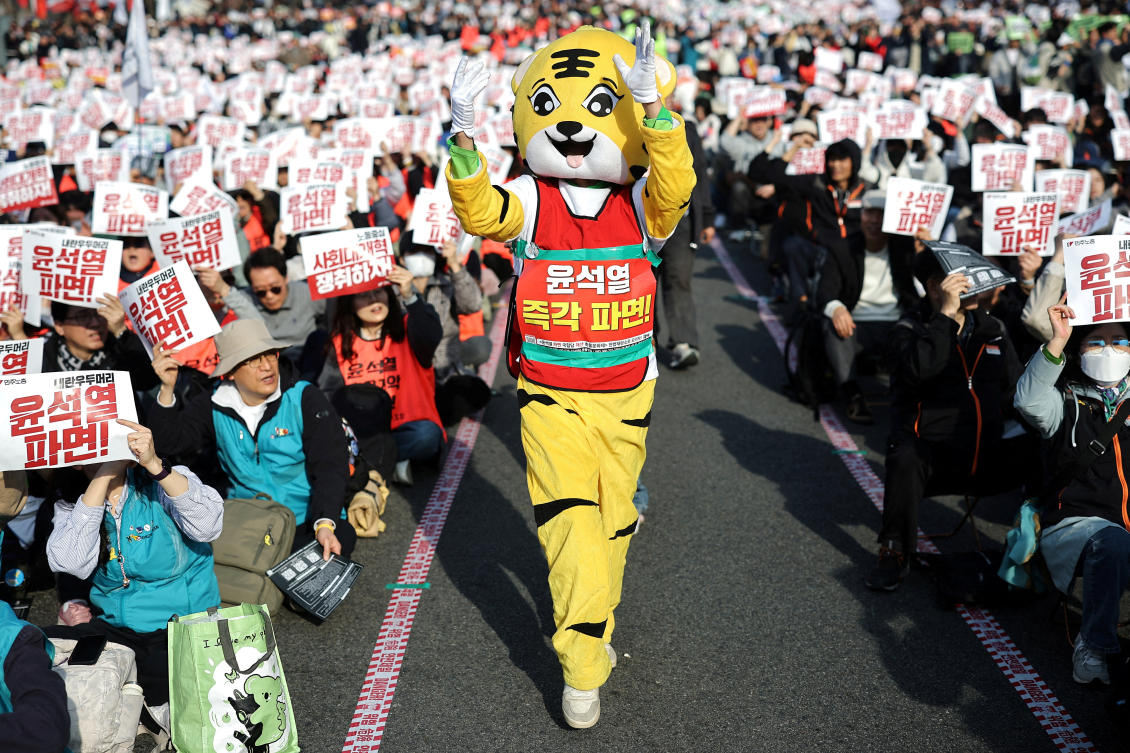 People attend a rally in central Seoul calling for immediate expulsion of impeached South Korean President Yoon Suk Yeol on March 15, 2025. (Reuters)
