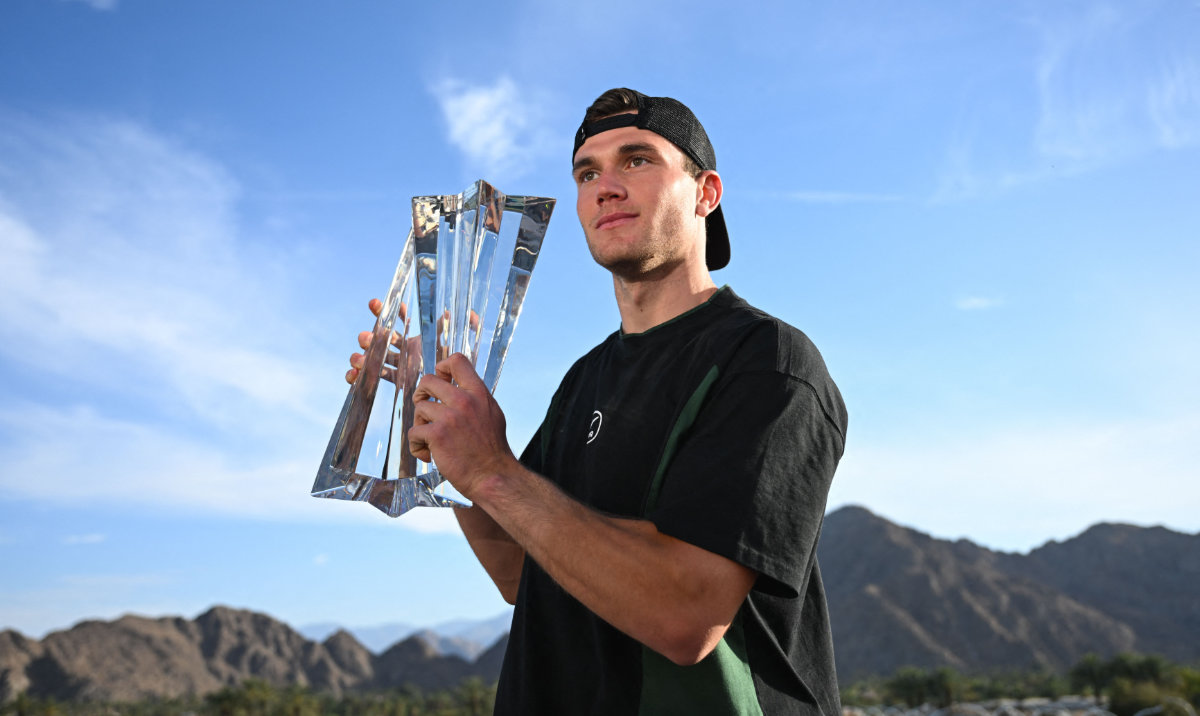 Britain’s Jack Draper stands for a portrait with his trophy after winning the men’s singles match against Denmark’s Holger Rune during the BNP Paribas Open at the Indian Wells Tennis Garden in Indian Wells, California, on March 16, 2025. (AFP)