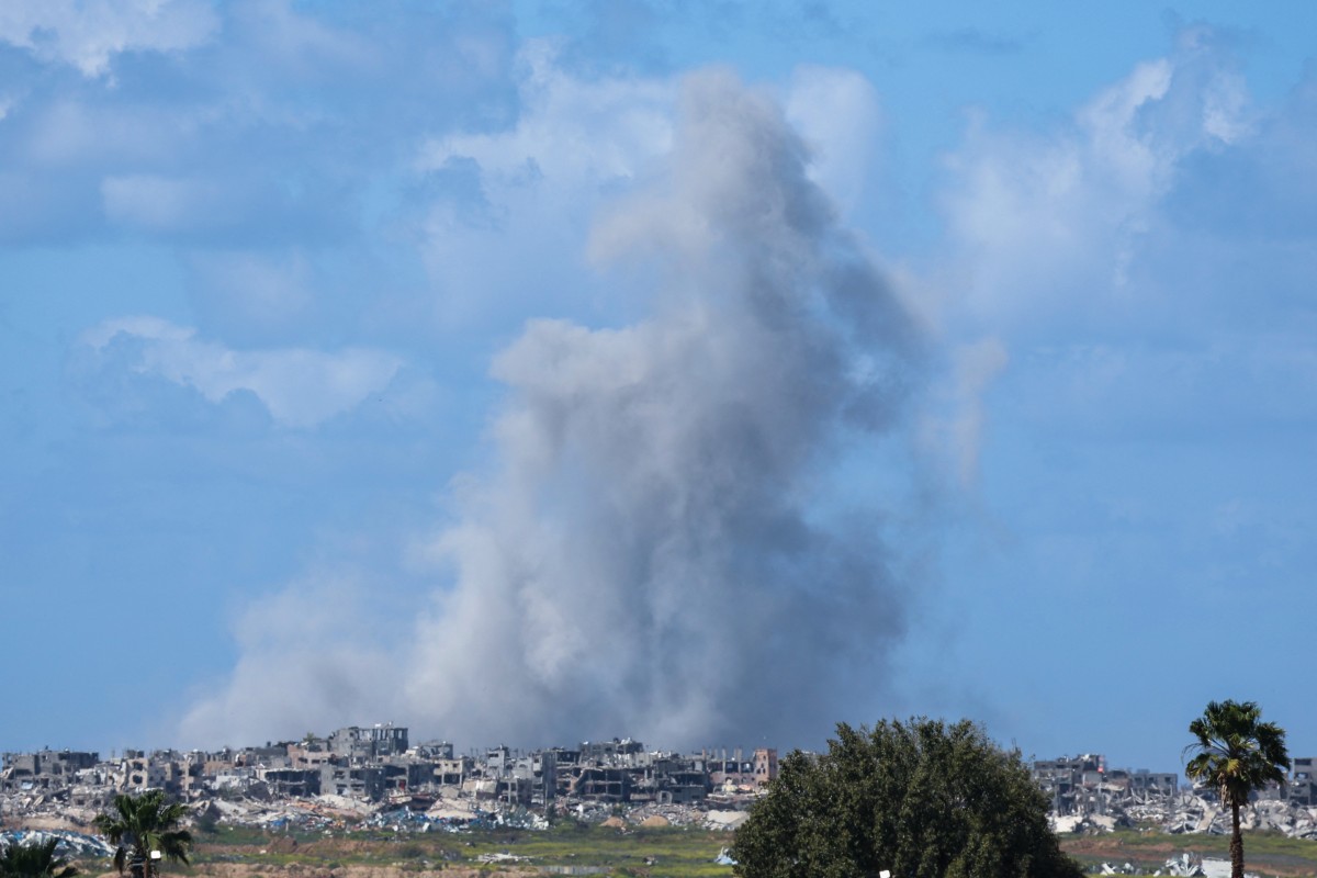 In this picture, taken from Israel's southern border with the Gaza Strip, smoke rises over destroyed buildings in northern Gaza on March 19, 2025. (File/AFP)