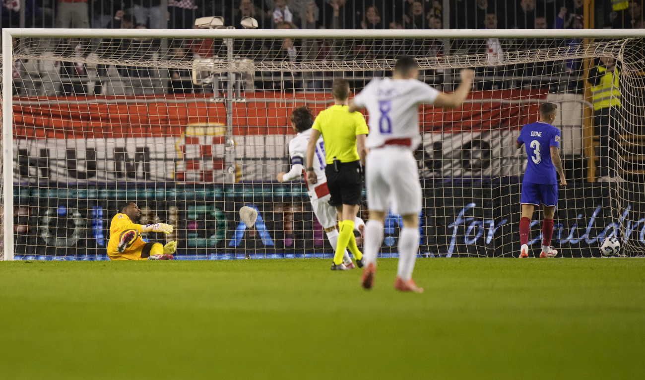 France's goalkeeper Mike Maignan fails to stop a header by Croatia's Ante Budimir during the UEFA Nations League quarterfinal soccer match between Croatia and France, at the Poljud stadium in Split, Croatia, Thursday, March 20, 2025. (AP)
