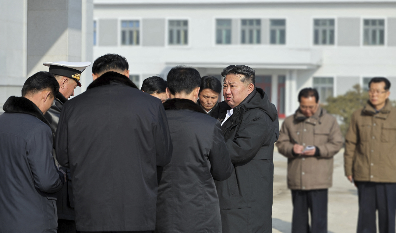 This picture released from North Korea's official Korean Central News Agency (KCNA) via KNS on March 8, 2025 shows North Korean leader Kim Jong Un (front C) inspecting a shipbuilding project at a major shipyard in North Korea. (AFP/File)