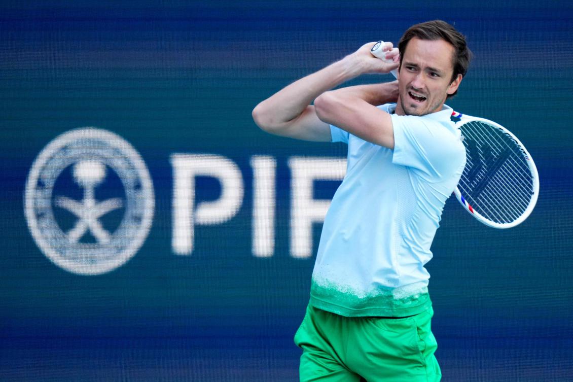 Daniil Medvedev returns a shot against Juame Munar of Spain during their match on Day 4 at Hard Rock Stadium on Mar. 21, 2025 in Miami Gardens, Florida. (AFP)