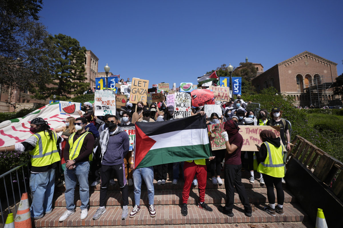 Demonstrators gather on the UCLA campus after nighttime clashes between pro-Israel and pro-Palestinian groups in Los Angeles on May 1, 2024. (AP Photo/File)