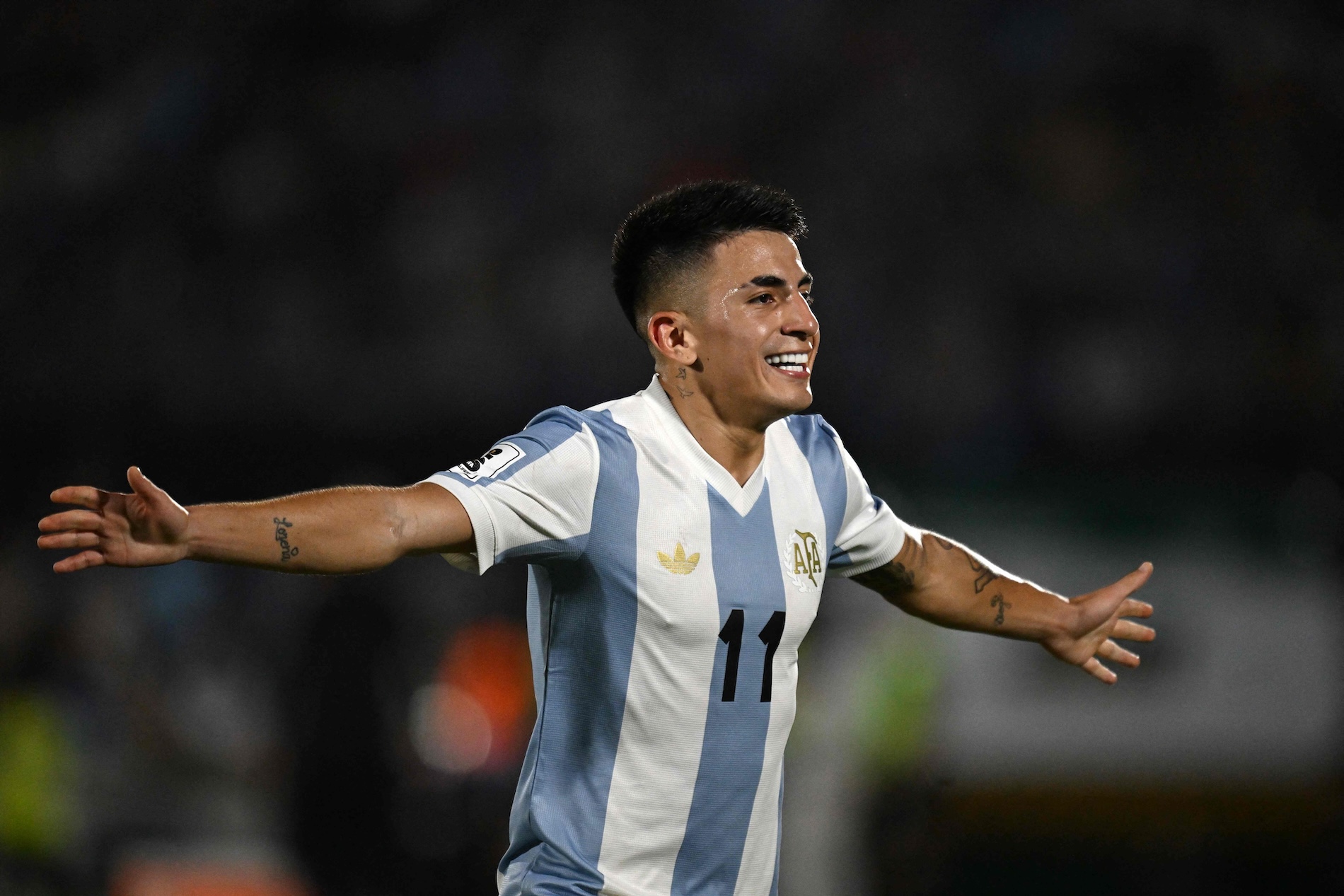 Argentina’s midfielder Thiago Almada celebrates after scoring during the 2026 FIFA World Cup South American qualifiers football match between Uruguay and Argentina at the Centenario stadium in Montevideo, on Friday. (AFP)