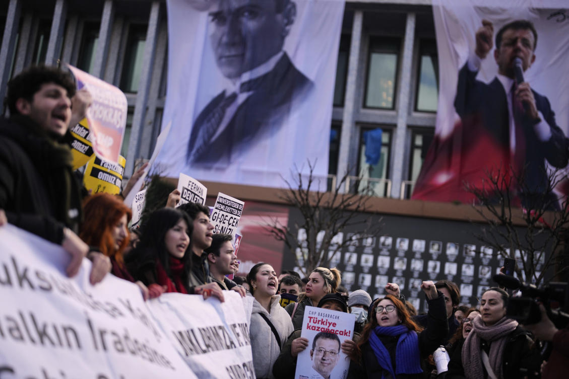 University students shout slogans as they march to protest the arrest of Istanbul Mayor Ekrem Imamoglu, outside the Istanbul's city hall, Turkey, Thursday, March 20, 2025. (AP)