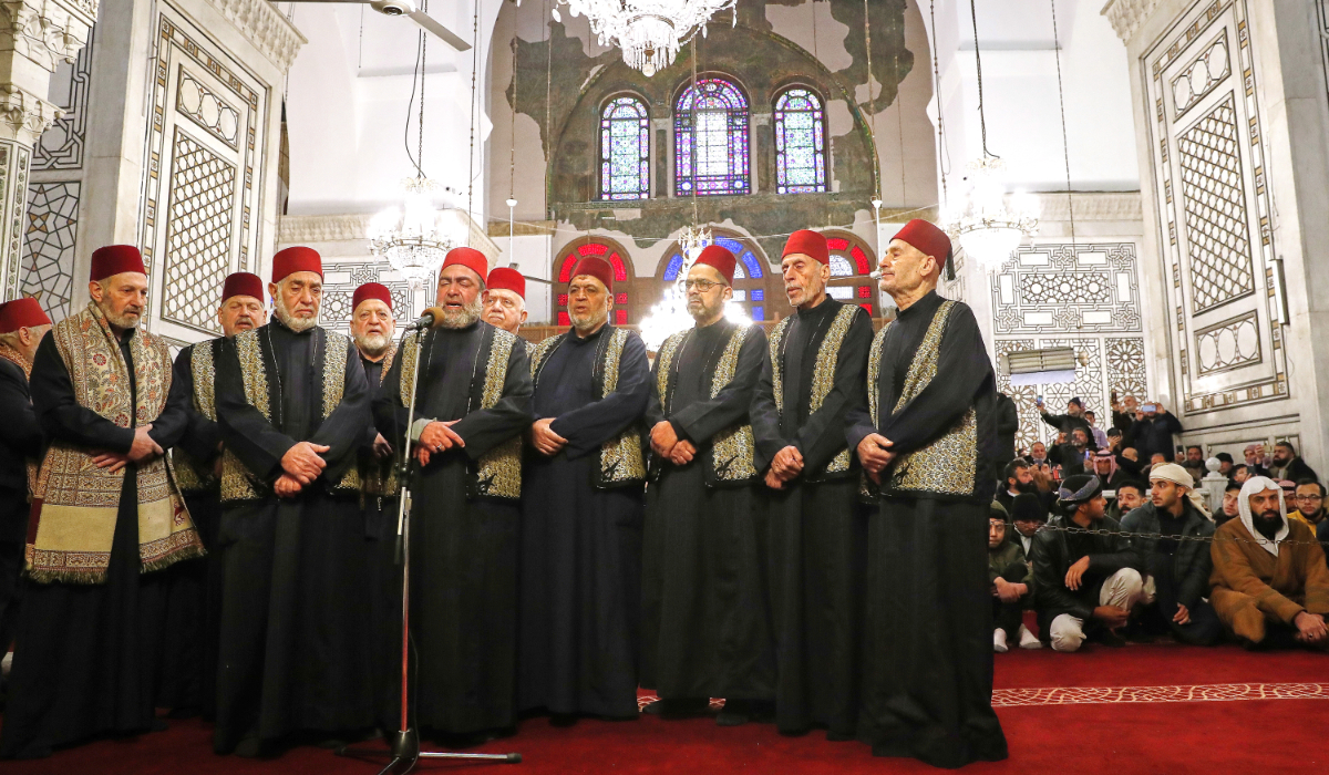 In Damascus’s Umayyad Mosque, a group of iconic sheikhs recites hymns in the presence of the faithful. (Reuters)