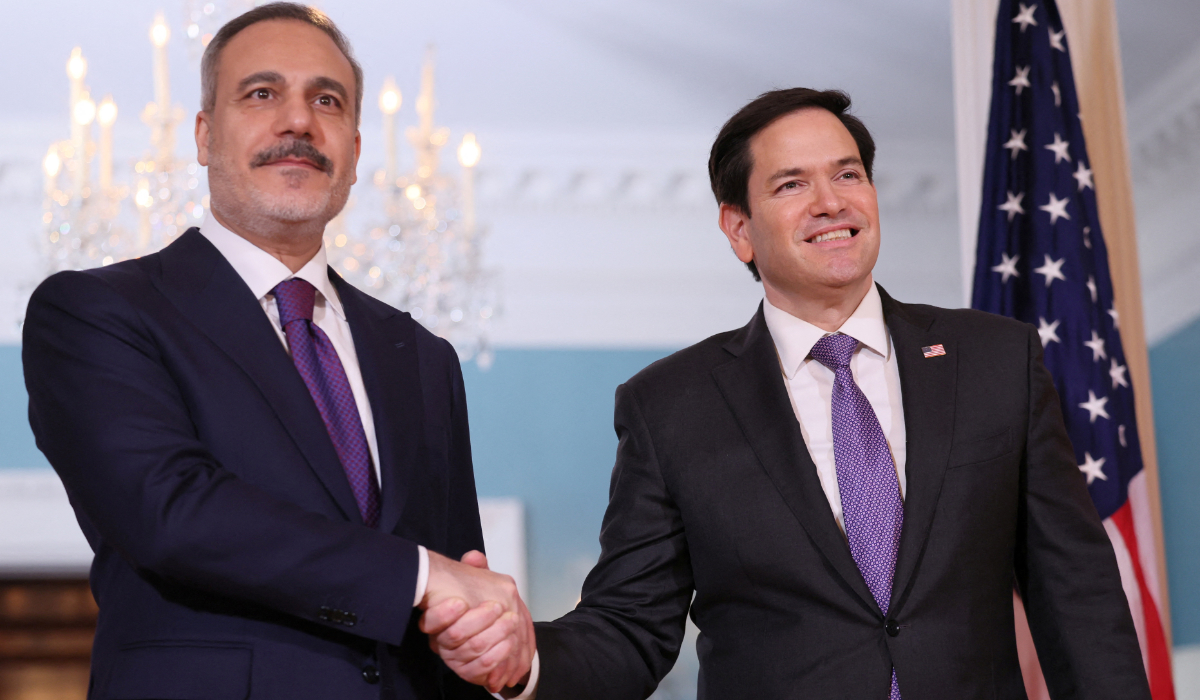 U.S. Secretary of State Marco Rubio shakes hands with Turkish Foreign Minister Hakan Fidan for members of the news media at the State Department in Washington, D.C., U.S., March 25, 2025. (REUTERS)