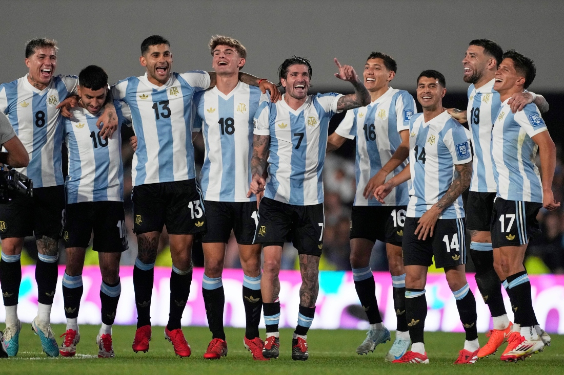 Argentina players celebrate defeating Brazil in a World Cup 2026 qualifying soccer match at Monumental Stadium in Buenos Aires Tuesday. (AP)
