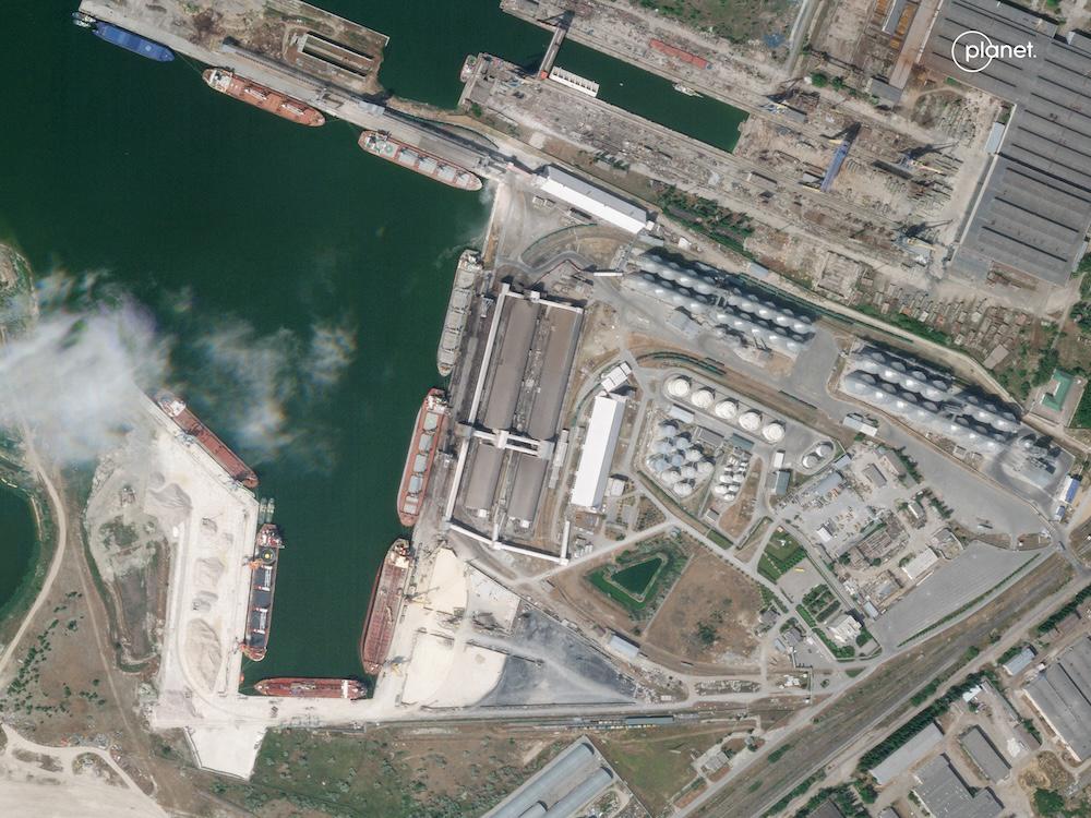 Above, a grain storage terminal in the port of Mykolayiv on May 31, 2022. (Labs PBC/AFP)