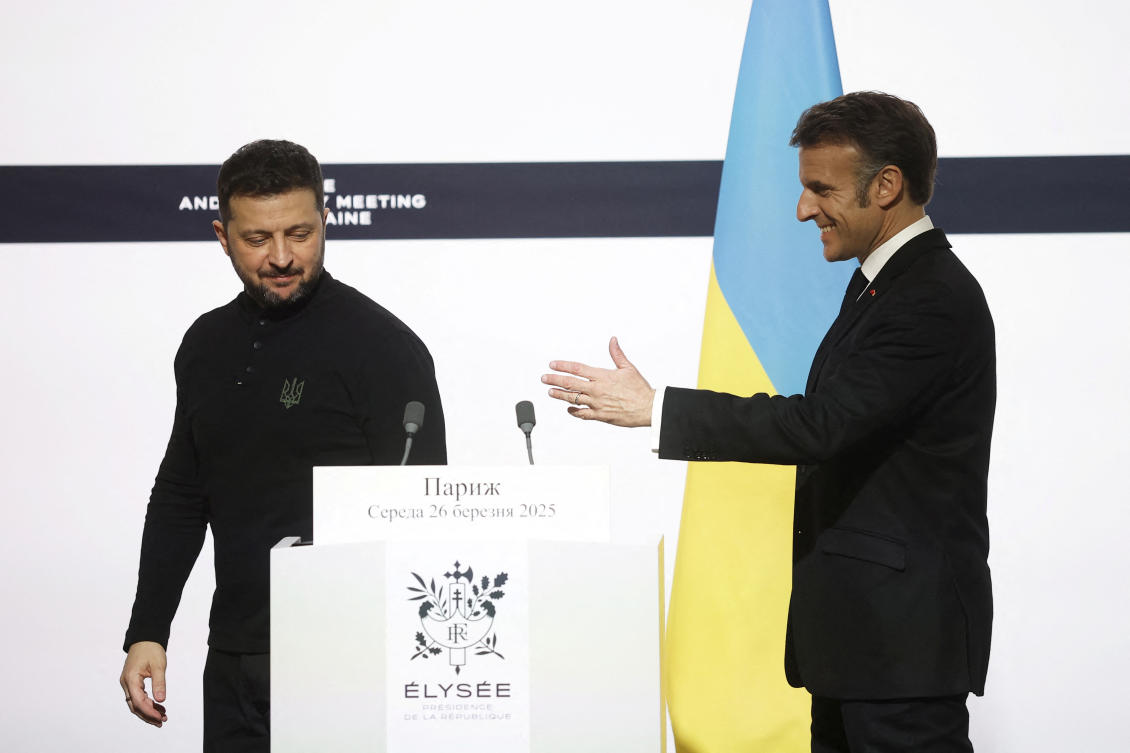 French President Emmanuel Macron and Ukrainian President Volodymyr Zelensky at the end of a press conference following a bilateral meeting at the Elysee Palace in Paris, Mar. 26, 2025. (Reuters)