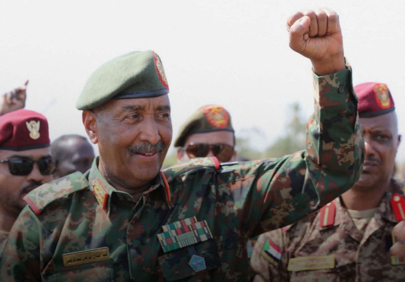 Sudan’s army chief Abdel Fattah Al-Burhan gestures to soldiers inside the presidential palace after the Sudanese army said it had taken control of the building, in Khartoum, Sudan March 26, 2025. (Reuters)