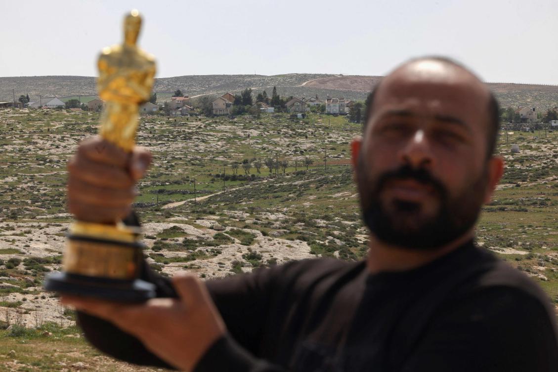 Palestinian filmmaker says Israeli settlers assaulted him for winning Oscar