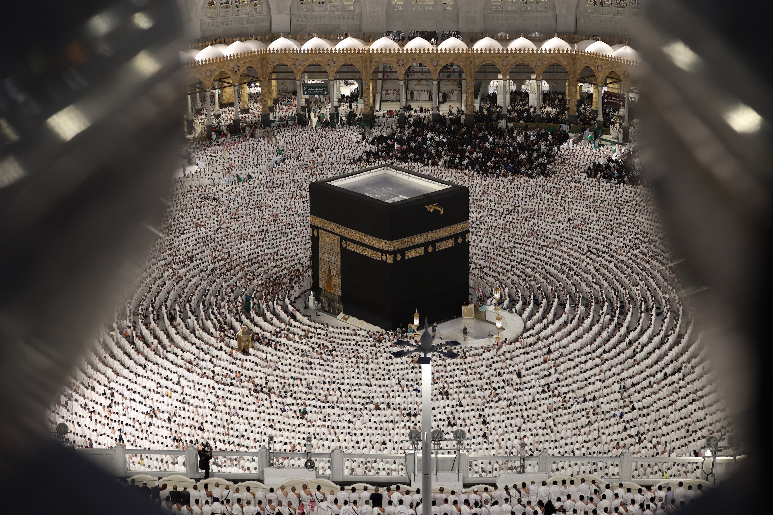 Muslims pray around the Kaaba at the Grand Mosque in the holy city of Mecca on Laylat al-Qadr or Night of Destiny, one of the holiest nights during the holy fasting month of Ramadan, Mar. 26, 2025. (AFP)