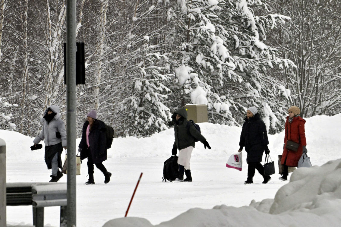 Migrants arrive at the Vaalimaa border check point between Finland and Russia in Virolahti, Finland Dec. 15, 2023. (Reuters/File)