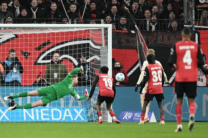With eight games remaining in the Bundesliga season, Bayer Leverkusen coach Xabi Alonso promised his side would "fight until the end" in their chase of league leaders Bayern Munich. (AFP/File)