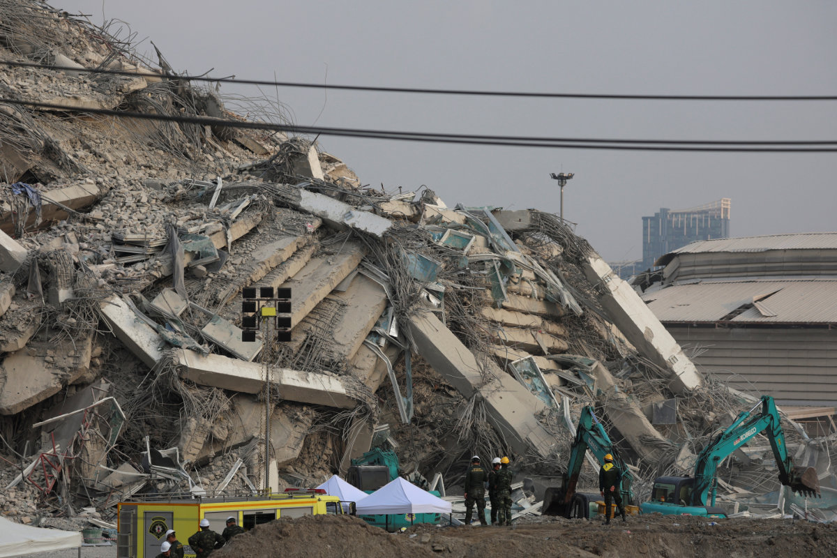 Rescue personnel work at the site of a building that collapsed, following a strong earthquake, in Bangkok, Thailand, on March 28, 2025. (REUTERS)