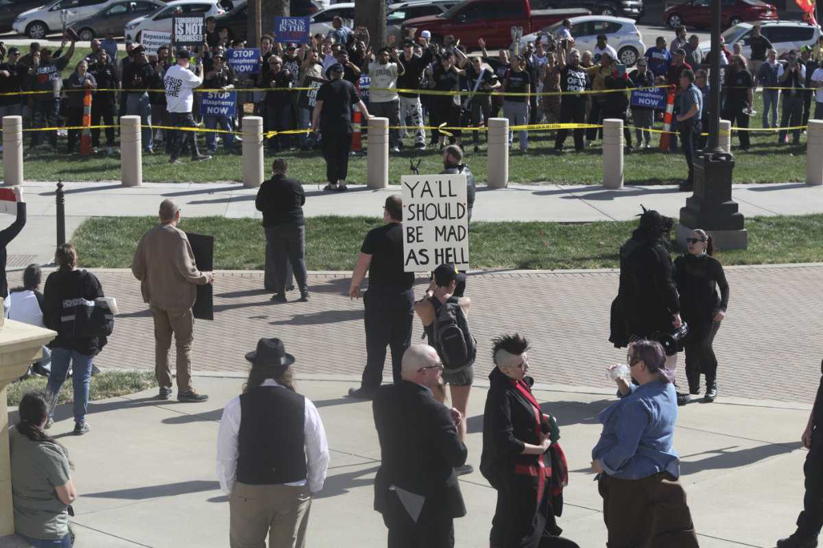Satanist leader’s attempt to hold ‘Black Mass’ inside US statehouse sparks chaos and arrests