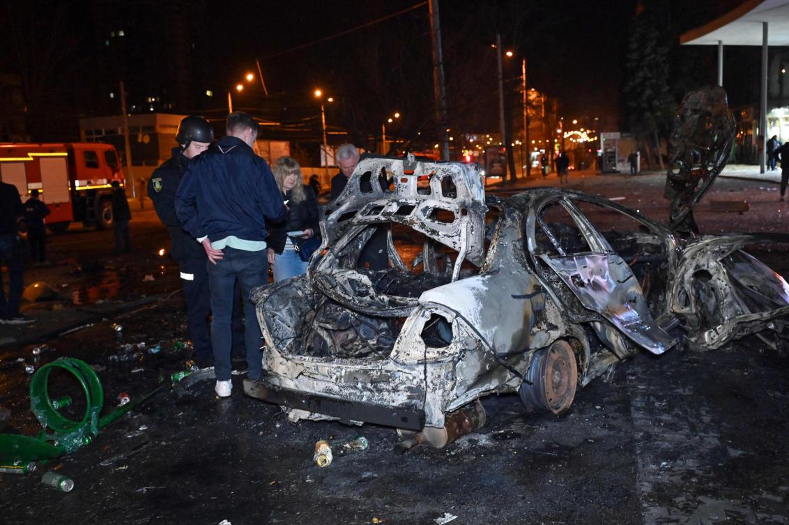 Ukrainian officials say two people were killed when Russian drones struck a military hospital, shopping center and apartment buildings in Kharkiv late Saturday. (AFP)