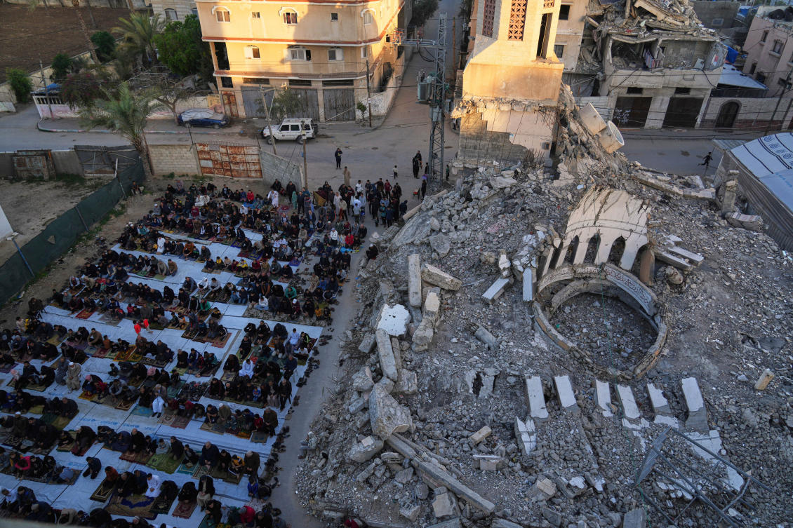 Palestinians in the Gaza Strip had little to celebrate on Sunday as they began marking a normally festive Muslim holiday with rapidly dwindling food supplies and no end in sight to the Israel-Hamas war. (AP)