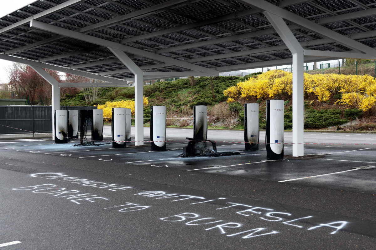 A photo shows damaged and destroyed Tesla charging stations, burnt on the day of a so-called "Tesla Takedown"call for a global day of action against US electric carmaker Tesla, in Saint-Chamond, central France, on March 29, 2025.(AFP)