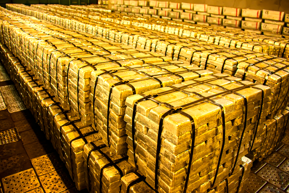 Gold, traditionally seen as a hedge against political and economic uncertainties, has risen over 18 percent so far this quarter. Shutterstock