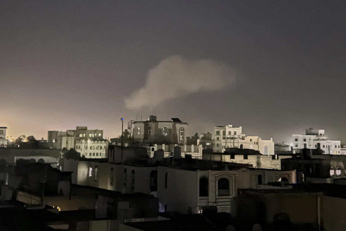 Smoke rises from a location reportedly struck by US airstrikes in Sanaa, Yemen, on Sunday. (AP)