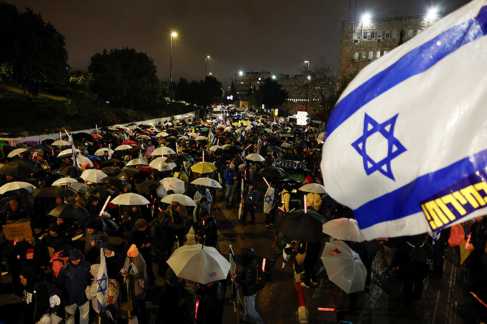 People rally against Israeli government and Israeli Prime Minister Netanyahu, and demanding the release of hostages. (Reuters)