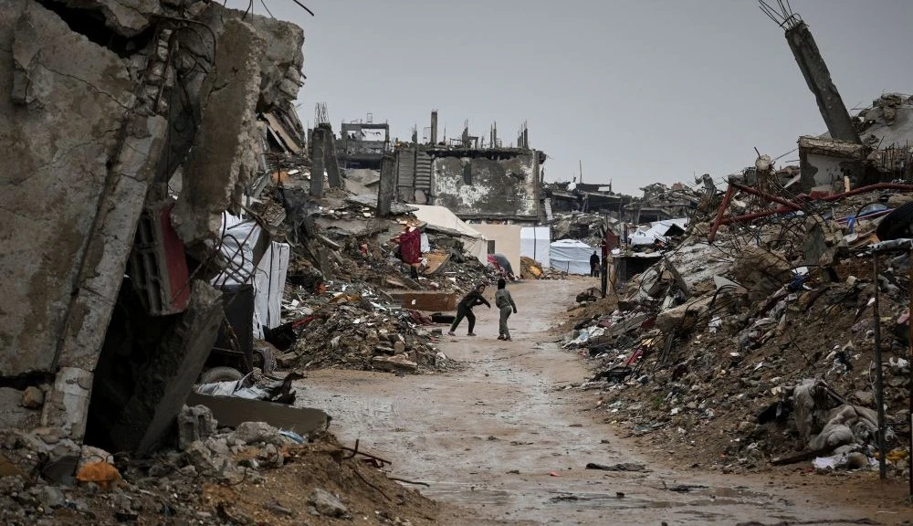 Children play by the rubble of destroyed homes and buildings in Jabaliya, northern Gaza Strip, Mar. 7, 2025 (AP Photo)