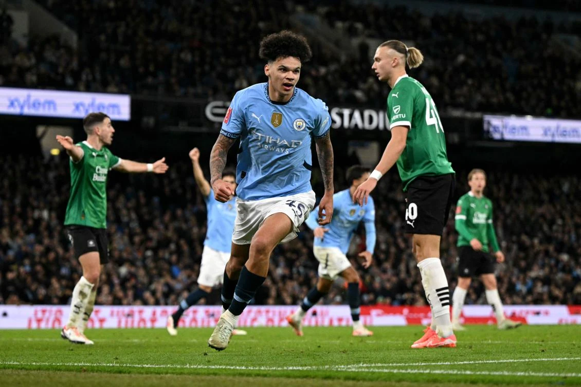 Manchester City’s English midfielder Nico O’Reilly celebrates scoring the team’s second goal during their English FA Cup fifth round match against Plymouth Argyle at the Etihad Stadium in Manchester, on Mar. 1, 2025. (AFP)