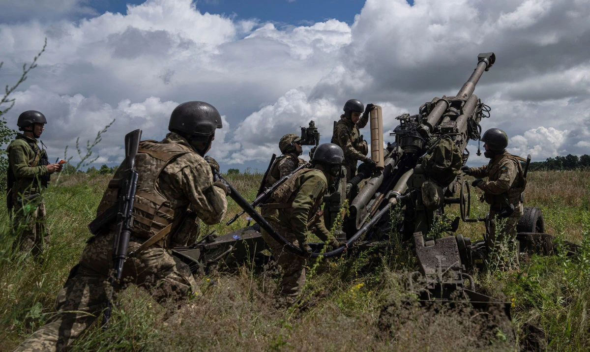 Ukrainian servicemen prepare to fire at Russian positions from a US-supplied M777 howitzer in Kharkiv region, Ukraine. (AP/File)