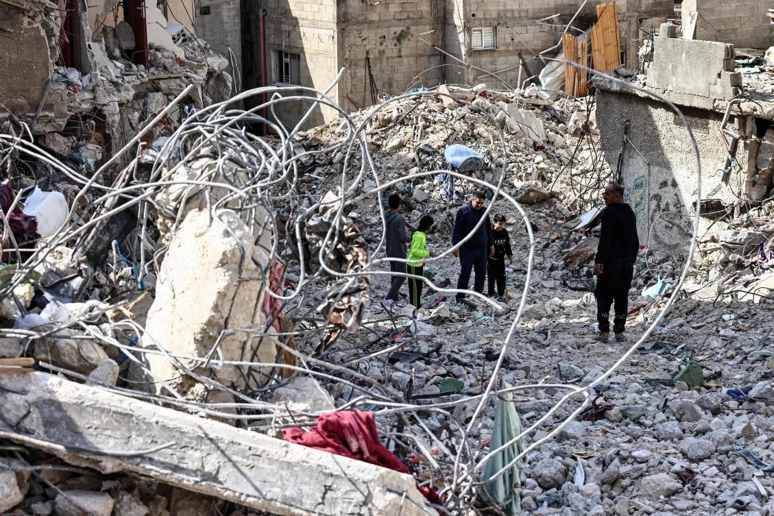People check the devastation in the Nur Shams camp for Palestinian refugees, in the occupied-West Bank on Mar. 5, 2025. (AFP)