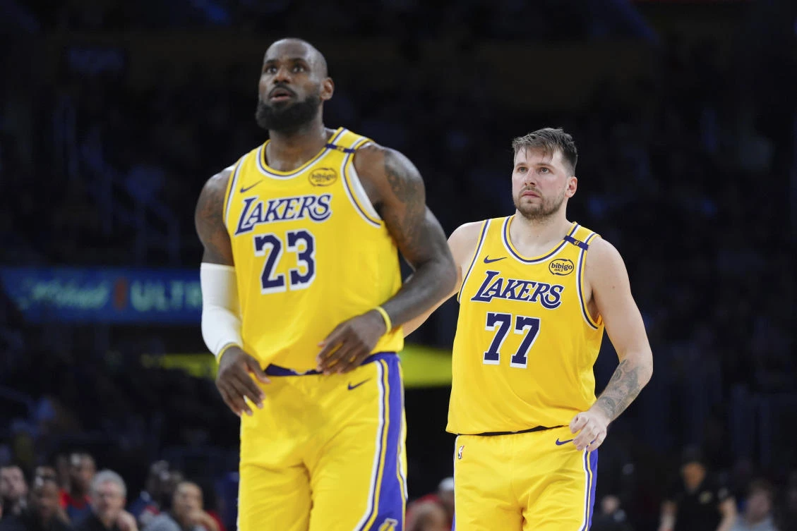 Los Angeles Lakers’ LeBron James and Luka Doncic combined for 63 points in their 113-109 overtime victory over the New York Knicks on Thursday. (AP)