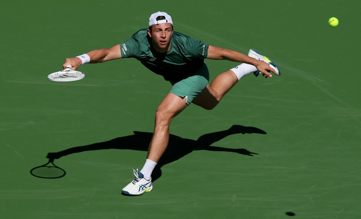 Tallon Griekspoor of the Netherlands plays a forehand against Alexander Zverev of Germany in their second round match during the BNP Paribas Open at Indian Wells Tennis Garden on March 07, 2025 in Indian Wells, California.(AFP)
