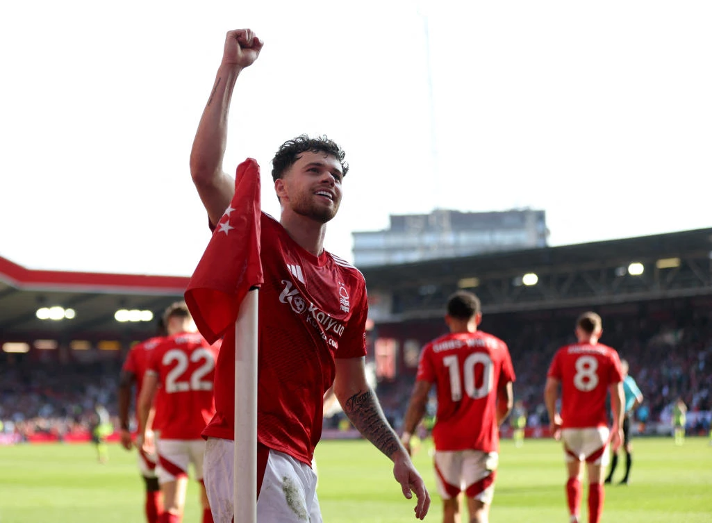 Nottingham Forest’s Neco Williams celebrates after Callum Hudson-Odoi scores their first goal during their Premier League match against Manchester City — The City Ground, Nottingham, Britain — Mar. 8, 2025. (Reuters)