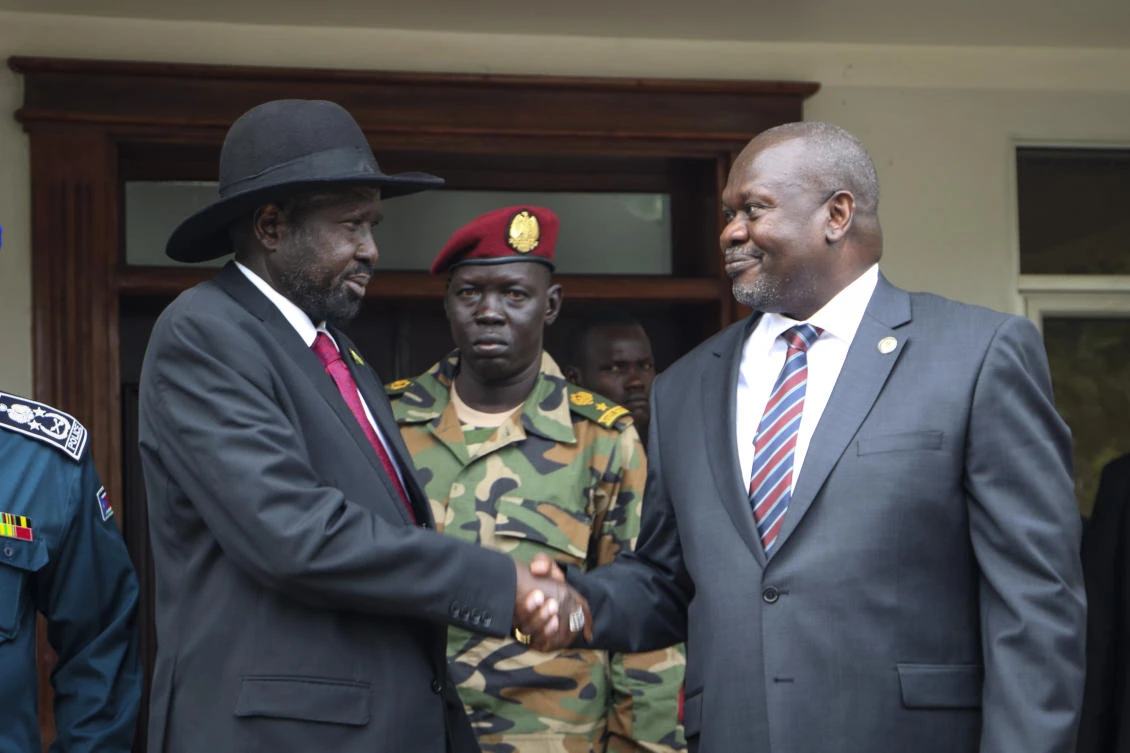 South Sudan’s president Salva Kiir and vice president Riek Machar shake hands after meetings in Juba, South Sudan, on Oct. 20, 2019, to discuss outstanding issues to the peace deal. (AP/File)